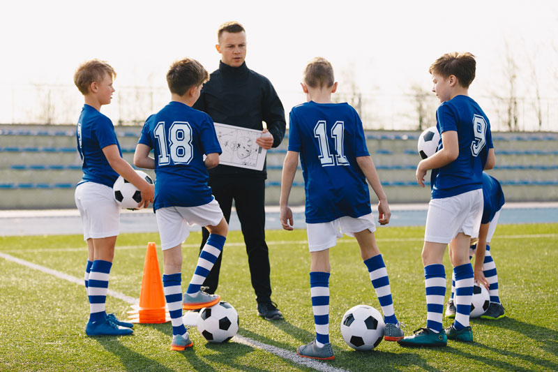 role coach ou club dans initiation sportive